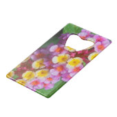 小さな黄色のピンクと紫の熱帯の花 クレジットカード栓抜き (正面アングル)