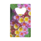 小さな黄色のピンクと紫の熱帯の花 クレジットカード栓抜き (裏面)