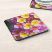 小さな黄色のピンクと紫の熱帯の花 コースター (左側)