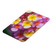 小さな黄色のピンクと紫の熱帯の花 マグネット (左側)