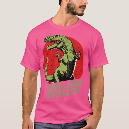 小型武器インストラクターおもしろいT-レックス恐竜ガン Tシャツ (正面)
