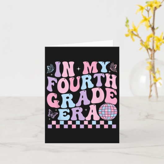 小学校4年生の時代の女の子が学校に戻る カード (黄色い花)