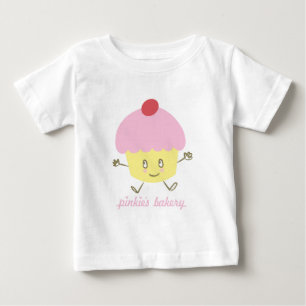 小指のベーカリーのカップケーキの乳児のTシャツ ベビーTシャツ