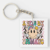 少しドラマチックなグルーヴおもしろいィーことわざ キーホルダー (正面)