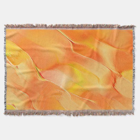 少し黄色と多くのオレンジで彫られた スローブランケット (正面)