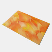 少し黄色と多くのオレンジで彫られた ドアマット (アングル)