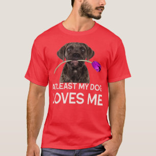 少なくとも私の犬は私を愛している Tシャツ