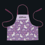 少女たちがかわいい紫の一角獣絵の子ども エプロン<br><div class="desc">このかわいい紫お洒落の子どもエプロンデザインは、一角獣の漫画、惑星、星、冠、虹、ハートの模様が描かれ、女の子の名前でパーソナライズされたもかまいません。料理人や庭師にとって最高の魔法の贈り物だ！</div>