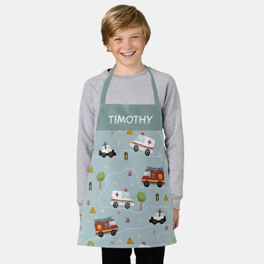 少年かわいい青い輸送パターンキッズ エプロン (着用した状態)