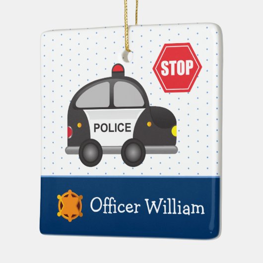 少年の警察官と車のクリスマス セラミックオーナメント (左)