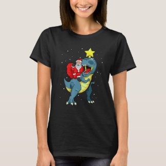 少年サンタクロースのティラノサウルス乗馬クリスマス Tシャツ