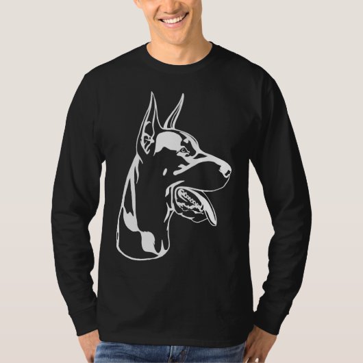 居座っているドバーマンの黒いシルエット Tシャツ (正面)