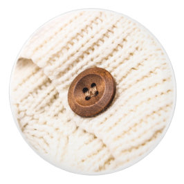 居心地の良いケーブルニットのセーターのボタン素朴な茶色のクリーム セラミックノブ