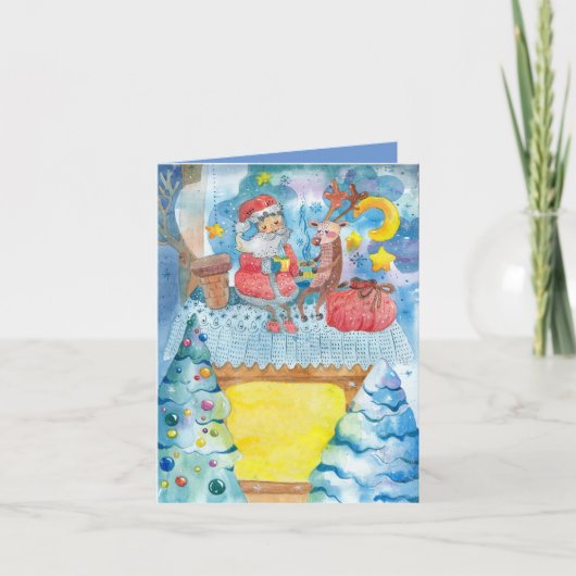 屋上で折り畳んだクリスマスグリーティングカードに乗る カード (正面)