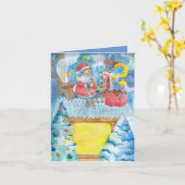 屋上で折り畳んだクリスマスグリーティングカードに乗る カード (黄色い花)