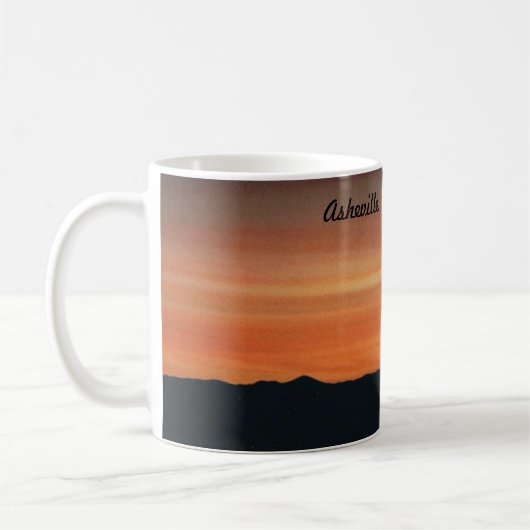 山の日没のシーンを含むマグカップ コーヒーマグカップ (左)