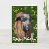 山羊の写真がこの枝とヤドリギの枠に写っている シーズンカード (正面)