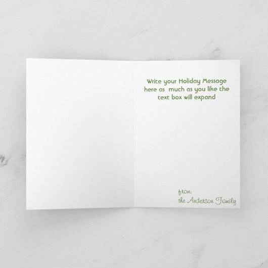 山羊の写真がこの枝とヤドリギの枠に写っている シーズンカード (内部)