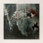 岩に鎖でつながれた ジグソーパズル (横)