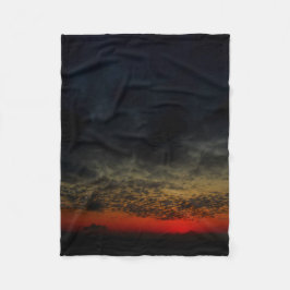 嵐の前の夕日 フリースブランケット