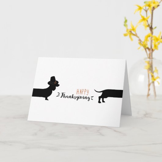 巡礼者の帽子ハロウィンを持つおもしろいなダックスフント カード (黄色い花)