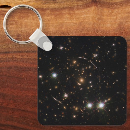 巨大な日が差すことクラスタ内の銀河系アーク キーホルダー (正面)