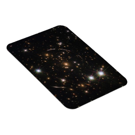 巨大な日が差すことクラスタ内の銀河系アーク マグネット (右側)