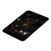 巨大な日が差すことクラスタ内の銀河系アーク マグネット (左側)