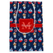 帆船と熊のパターンモノグラムの ミディアムペーパーバッグ (正面)