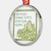 常に片目の開いたドラゴンで眠る メタルオーナメント (左)