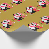 帽子とスカーフを身に着けたクリスマスペンギン ラッピングペーパー (角)