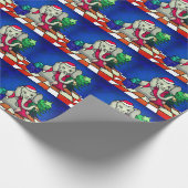 帽子、スカーフおよび鐘を持つクリスマスのベビー象 ラッピングペーパー (角)