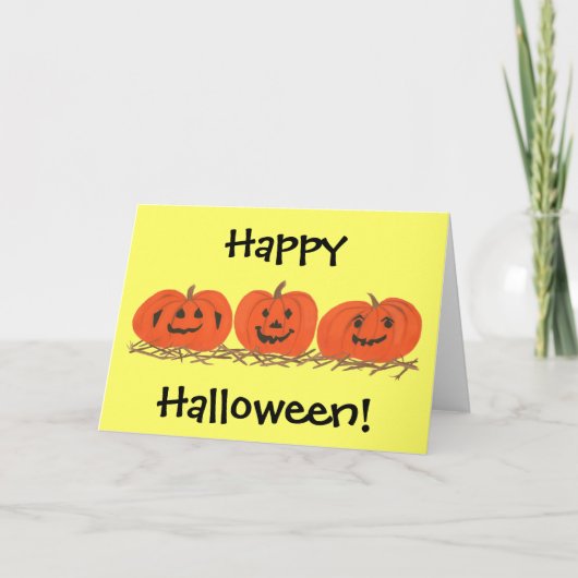 干し草のハロウィーンカードに3つの幸せなカボチャ カード (正面)