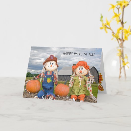 干し草ベールの秋のかかし カード (黄色い花)