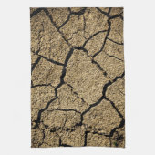干ばつで土が割れて乾いた土地 キッチンタオル (縦)