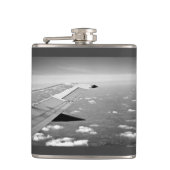 平らなテーマによってはのグレースケールの飛行機飛行が飛びます フラスク (正面)