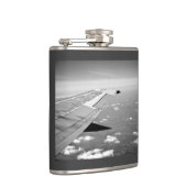 平らなテーマによってはのグレースケールの飛行機飛行が飛びます フラスク (右)