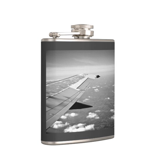 平らなテーマによってはのグレースケールの飛行機飛行が飛びます フラスク (右)