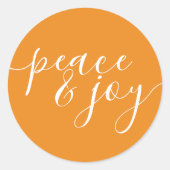 平和とモダン喜びオレンジのホワイトクリスマス ラウンドシール (正面)