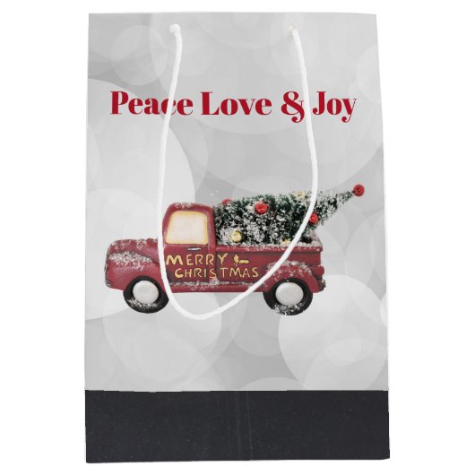 平和の愛と喜びのトイのトラックメリークリスマス ミディアムペーパーバッグ (正面)