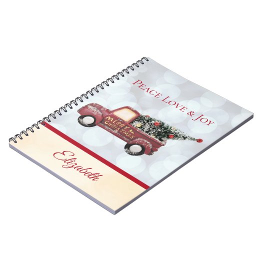 平和への愛と喜びのおもちゃのトラック、メリークリスマス ノートブック (左側)