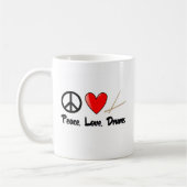 平和、愛およびドラム コーヒーマグカップ (左)