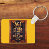 年は問題よりも気になる キーホルダー (正面)