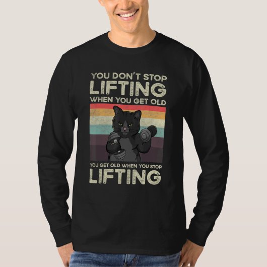 年をとったら筋トレをやめろなんてことはない、ネコさえも Tシャツ (正面)