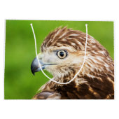 年少の赤によって後につかれるタカ ラージペーパーバッグ (裏面)