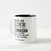 年長者は簡単。まるで自転車に乗っているようだ ツートーンマグカップ (正面左)