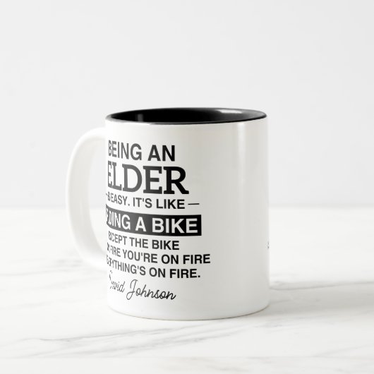 年長者は簡単。まるで自転車に乗っているようだ ツートーンマグカップ (正面左)