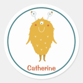 幸せそうな毛むくじゃらのオレンジ色の怪物3個の眼球 ラウンドシール