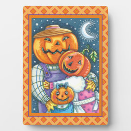 幸せなハロウィーンのカボチャのちょうちんカラフルファミリー フォトプラーク