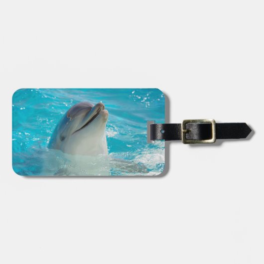 幸せな水泳のイルカ ラゲッジタグ (正面横)